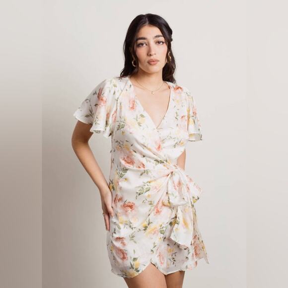 Vici SUNKISSED IVORY MULTI FLORAL SURPLICE MINI SKATER DRESS - Picture 1 of 10